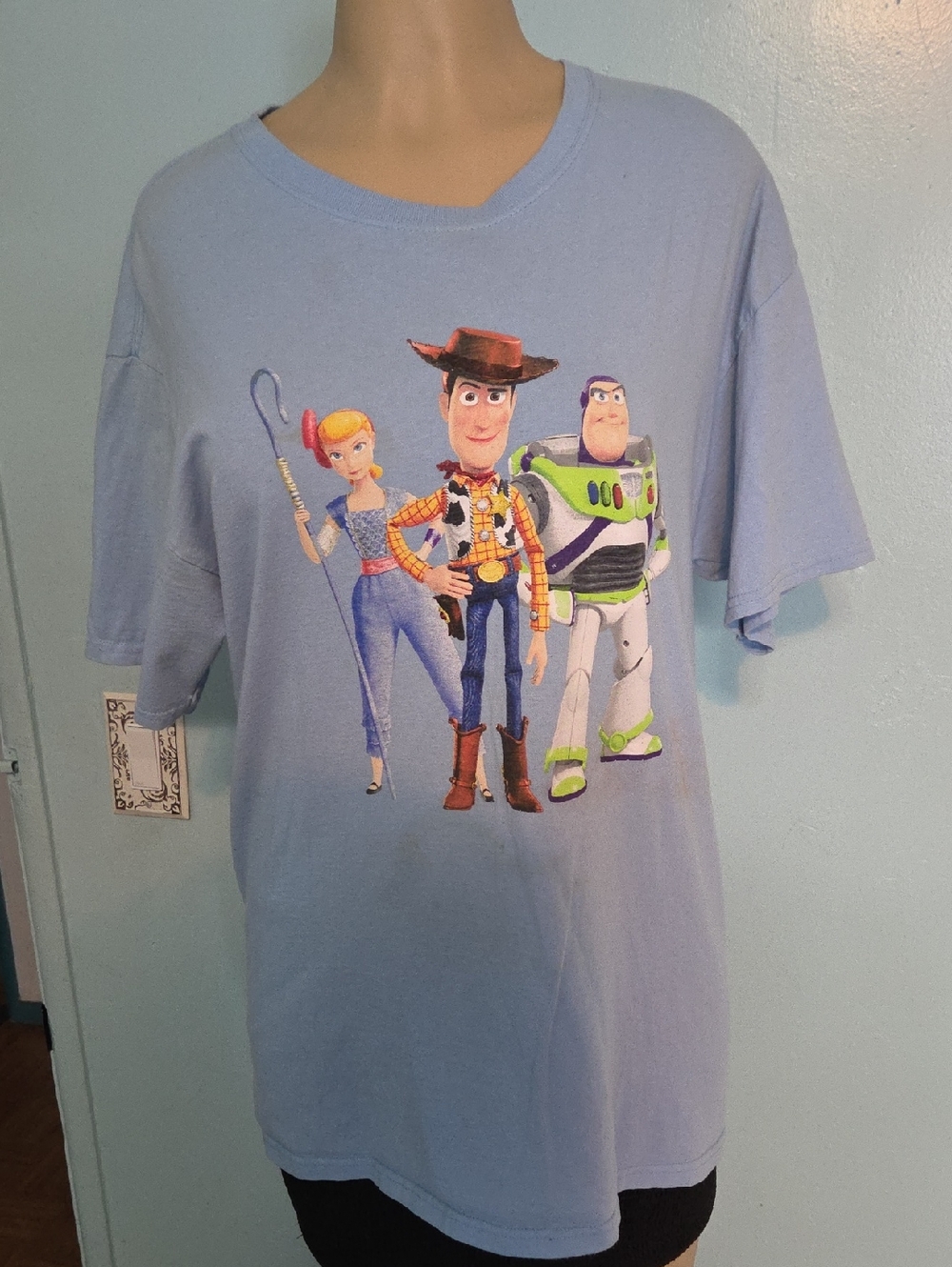 McDonald's Light Blue Toy Story Graphic Tee featuring Woody Buzz & Bo Peep